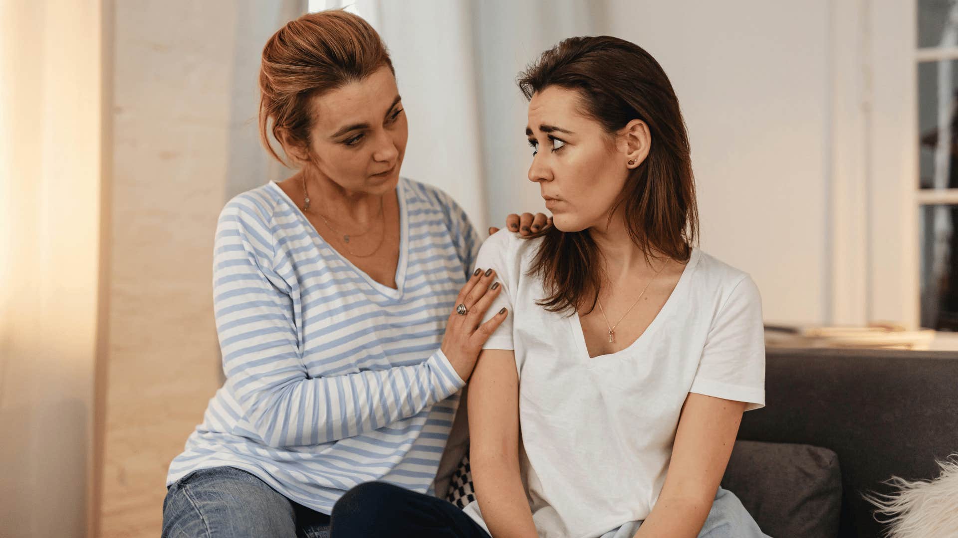 woman comforting her friend and validating her emotions