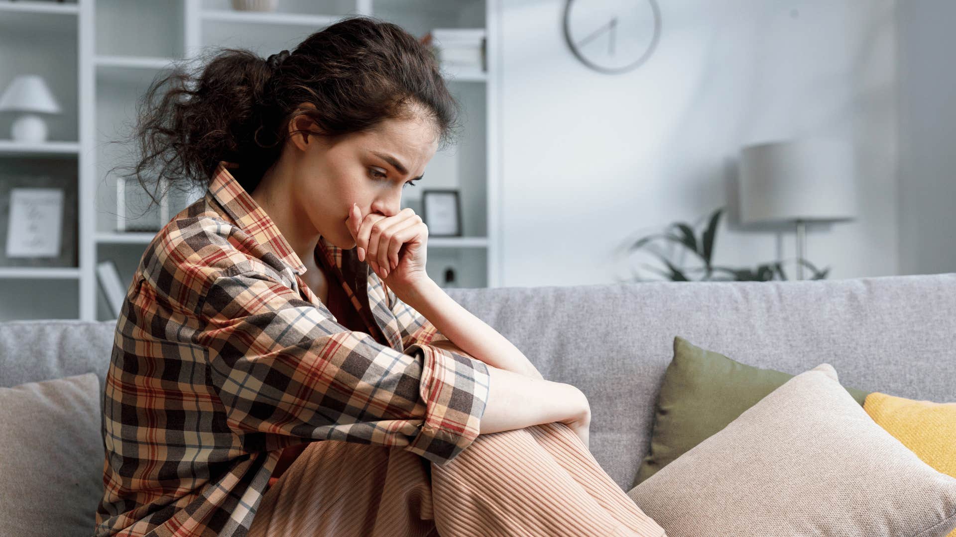 sad woman regretting not being kind to herself or others