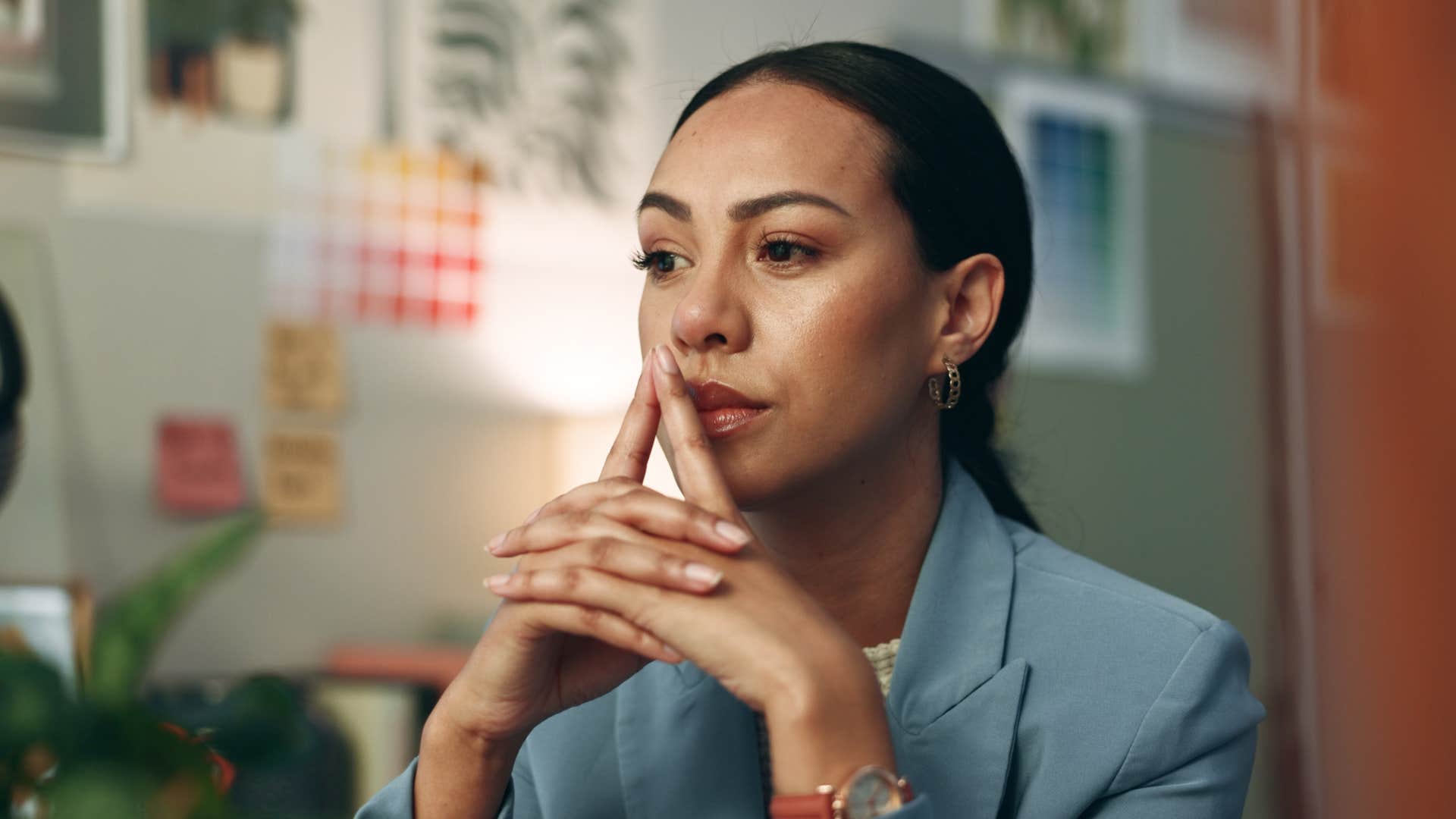 woman in deep thought noticing her repeated patterns