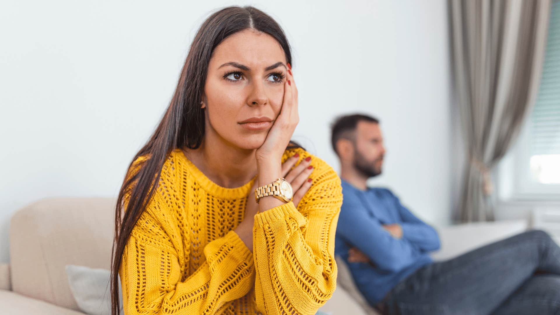couple ignoring each other woman feeling lonely in her relationship