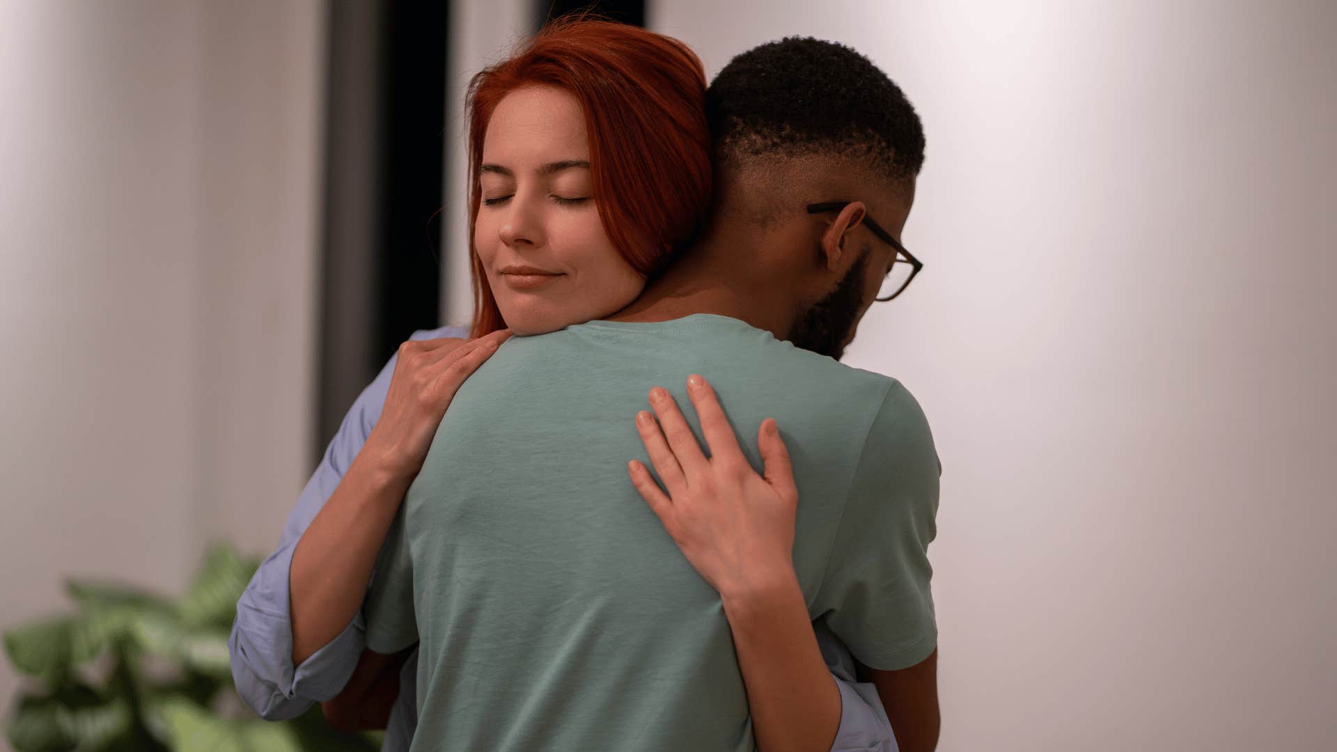 couple hugging after realizing they were both wrong