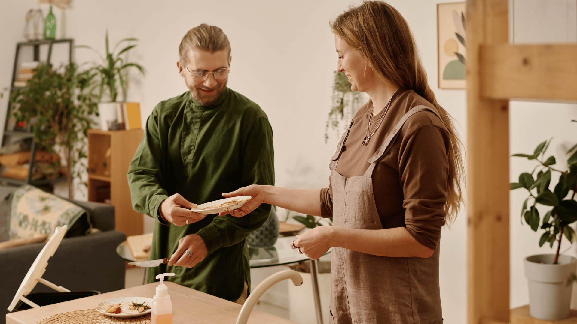 couple doing dishes together