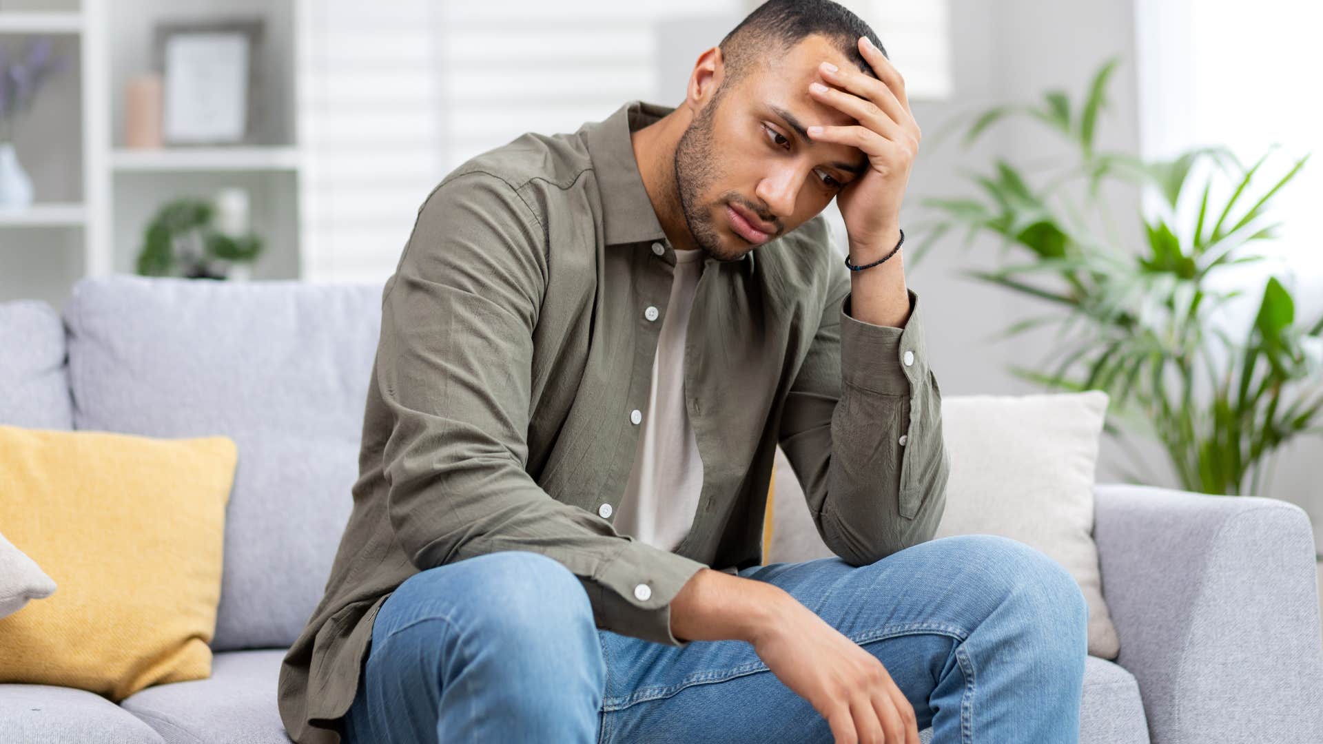 man feeling upset dealing with self-doubt