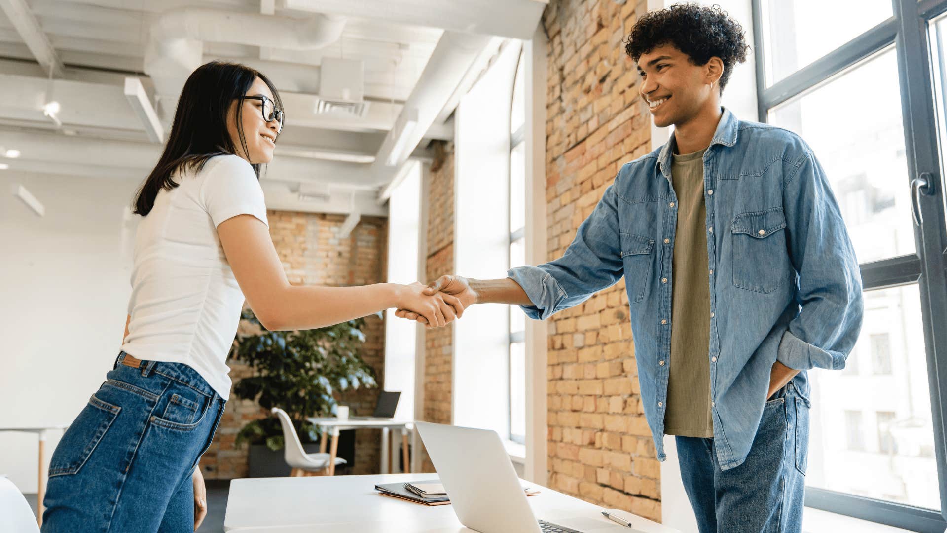 man and woman shaking hands forgetting each other's names