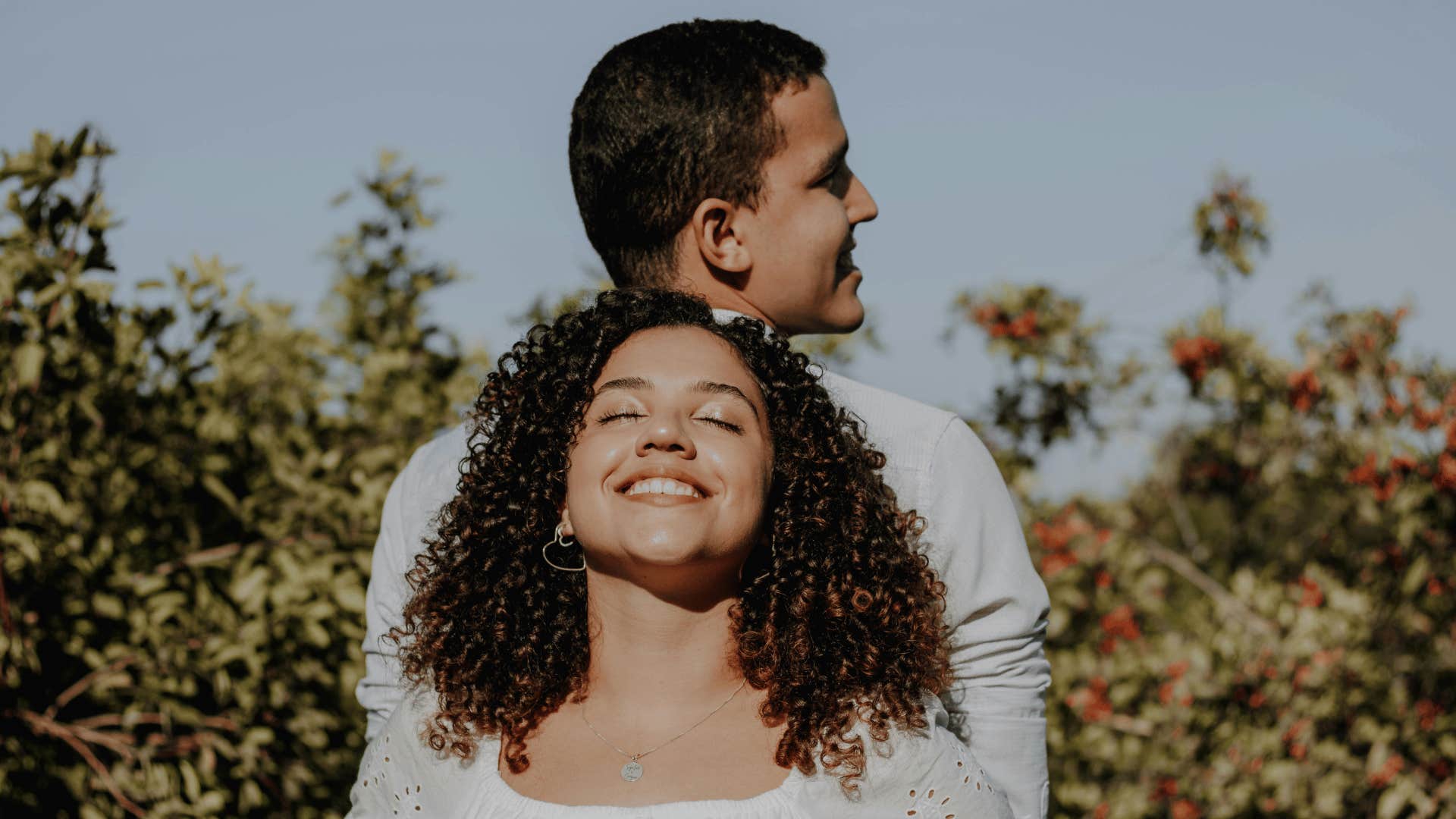 smiling couple is able to be real and honest with each other