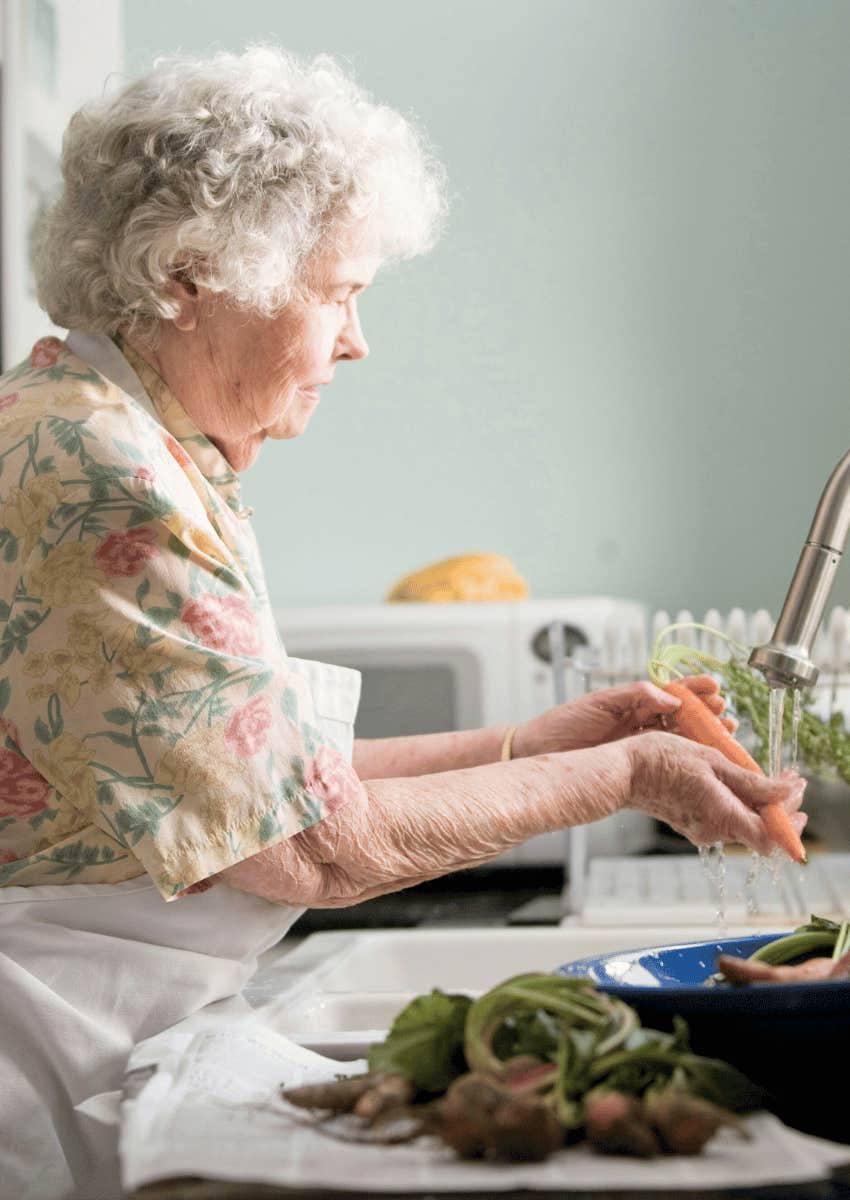 older woman changing her diet to ease common menopause symptoms