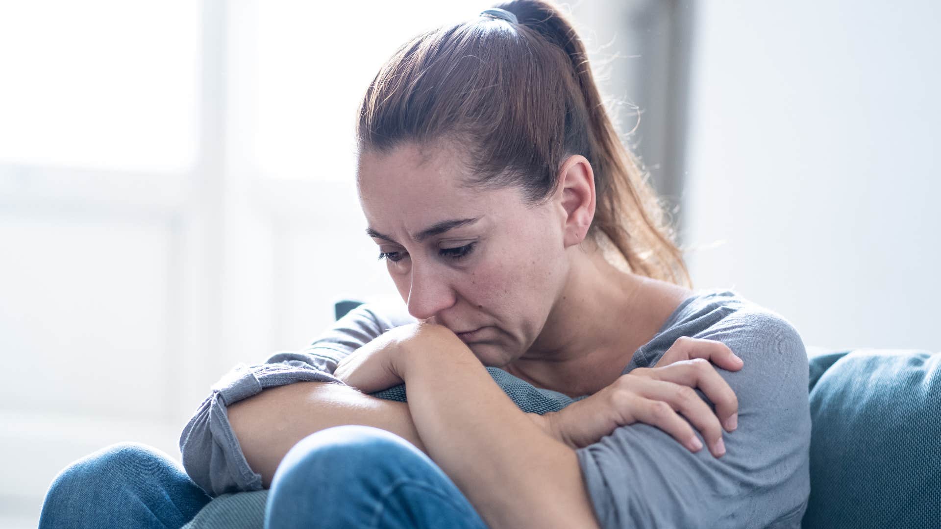 woman who struggles to enjoy life isolating herself