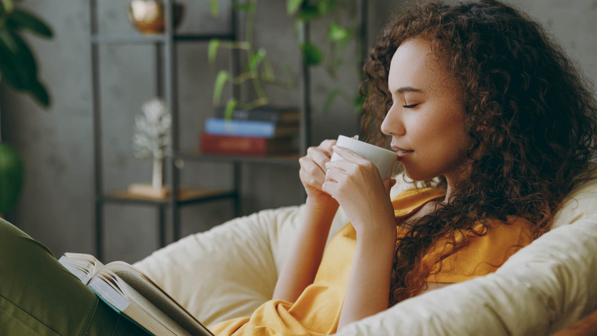 woman engaging in self-care at home ignoring her phone