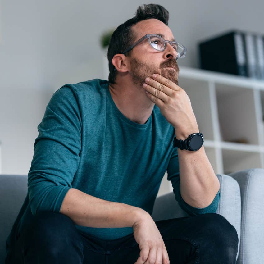 man who is prone to overthinking ignoring his phone