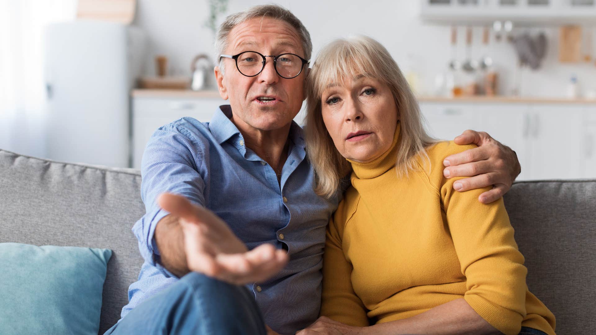 Toxic parents on a couch commanding their adult child to do what they want