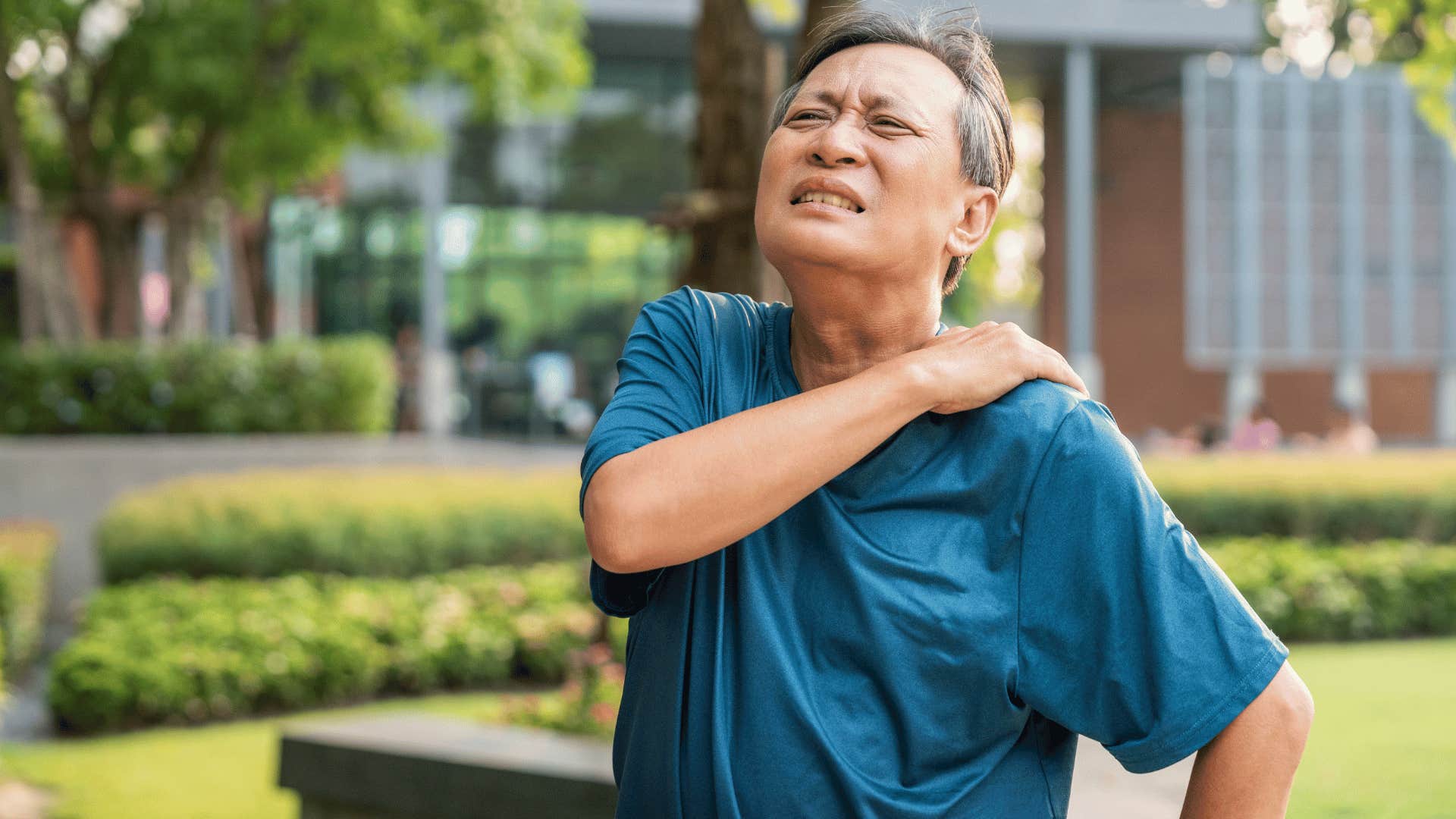 Man with aching neck isn't lazy he's overwhelmed and exhausted