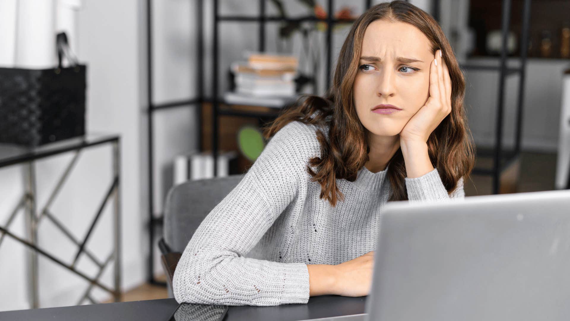 Woman looking exhausted at work isn't lazy she's overwhelmed 
