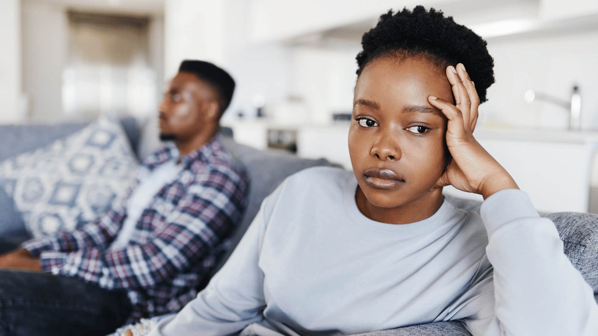 sad couple feeling emotionally disconnected from each other
