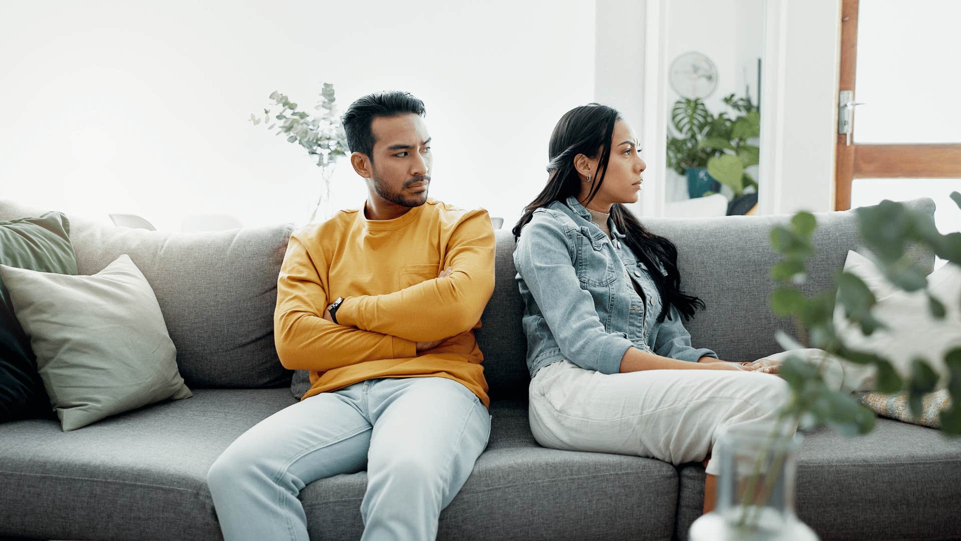 couple facing away from each other due to a lack of intimacy in their marriage