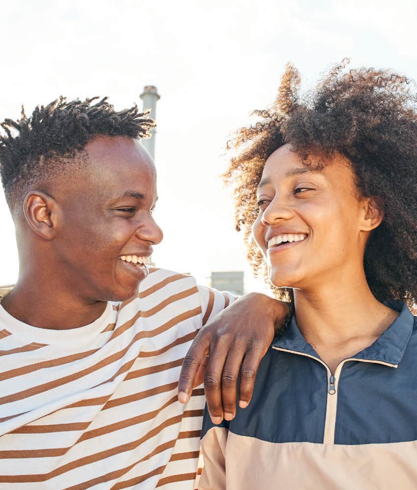 HAppy couple enjoy a walk showing willingness to make marriage work