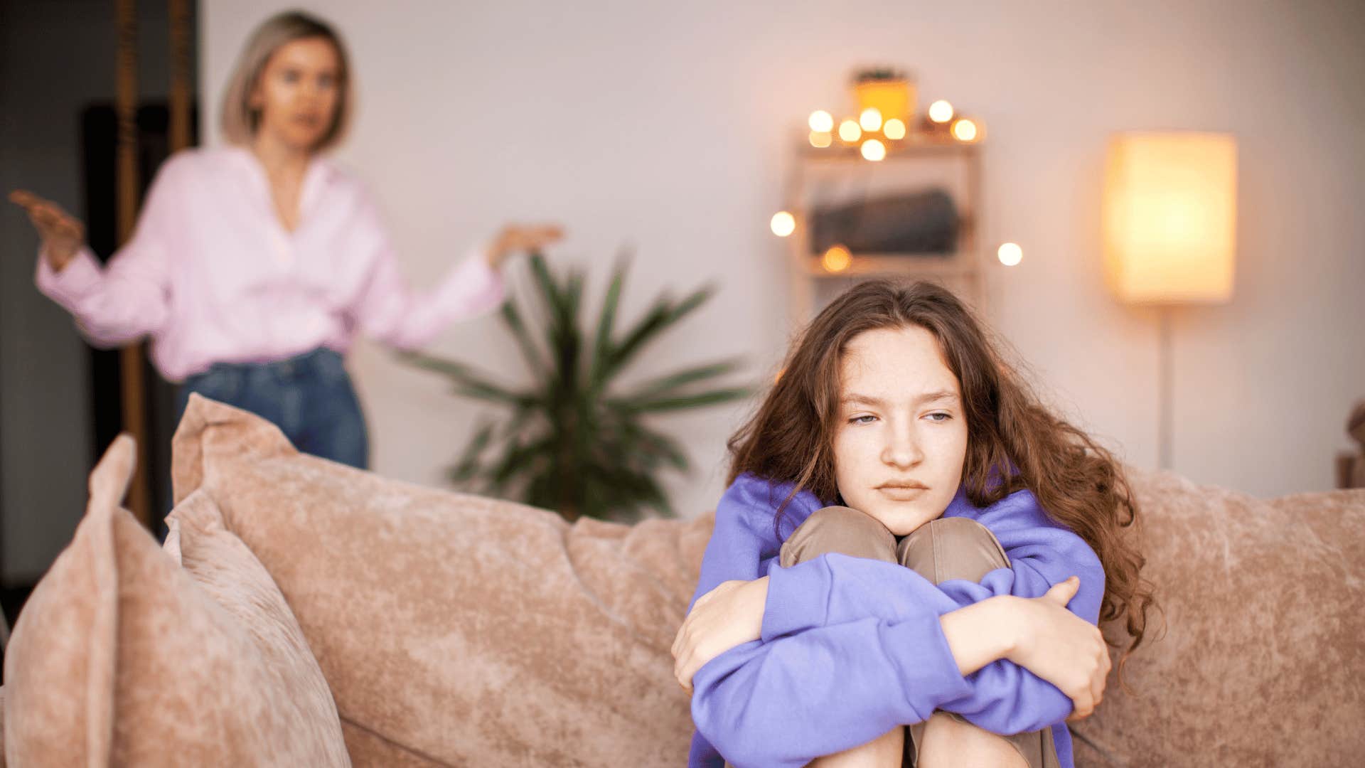 Mom being critical and harsh to her Gen Z teen daughter who looks sad at home