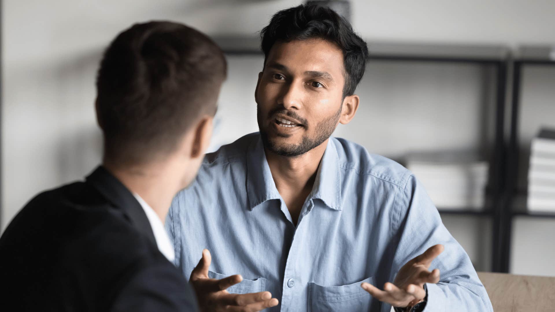 Man whose parents did an exceptional job listening to a coworker attentively